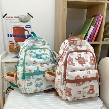 новый симпатичный рюкзак с граффити 2023 года большой емкости, облегченный рюкзак для младших школьников, уменьшающий нагрузку.